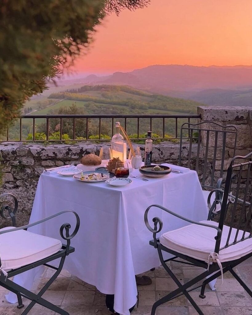 Borgo Pignano Volterra Tuscany Sunset Dining View by Windows on Travel